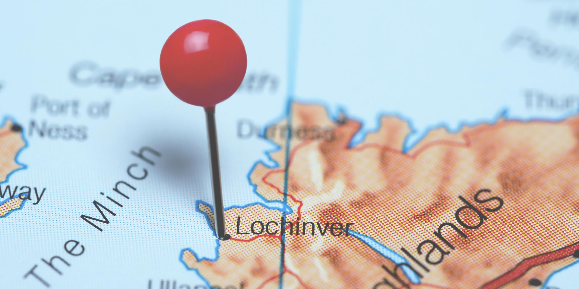 Lochinver pinned on a map of Scotland